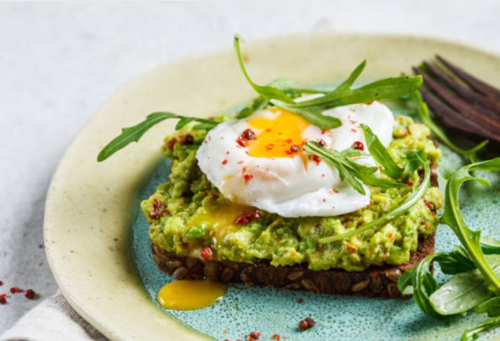 Poached eggs on smashed avocado
